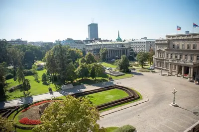 a view of a city with a park and buildings at Sweet House Parlament in Belgrade