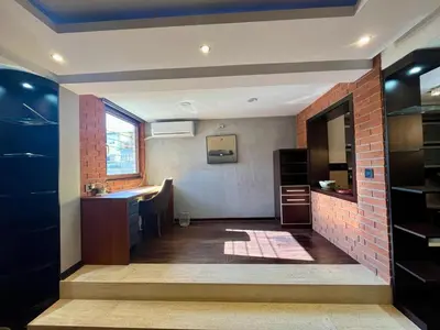 a bathroom with a counter and a sink in a room at Passpartu Apartments in Belgrade