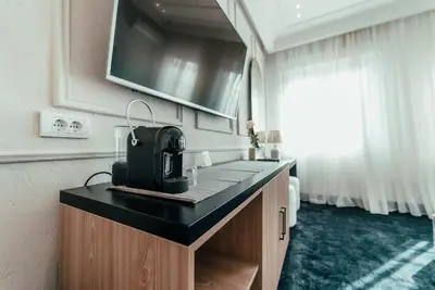 a kitchen with a coffee maker on a counter at Biarritz Luxury Apartments in Belgrade