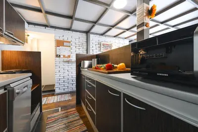 a kitchen with a counter with fruits on it at Family Penthouse with Terrace 5min to Kalemegdan in Belgrade