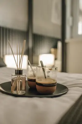 a plate with two bowls of food on a table at Apartman Premijer 1 in Čukarica