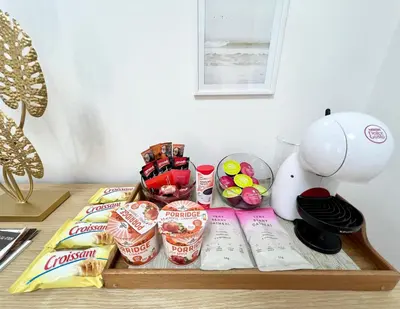 a table with snacks and a panda mixer on it at BeoCity 011 in Novi Beograd