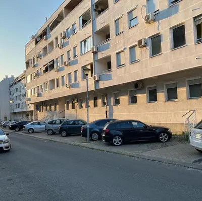 a row of cars parked in front of a building at BeoCity 011 in Novi Beograd