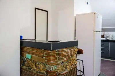 a mirror on top of a chest in a kitchen at Zvezdana noc in Zvezdara