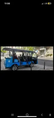 a blue bus with people riding in the back at Srce Beograda in Belgrade
