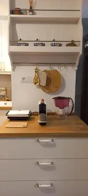 a kitchen with a counter top with a cutting board at Botanic Garden 1 in Belgrade