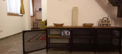 a room with a table with two bowls on it at Botanic Garden 1 in Belgrade
