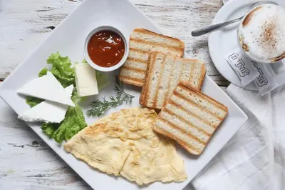 a plate of food with toast and salsa and dip at Guesthouse & restaurant Tekovina in Smederevo