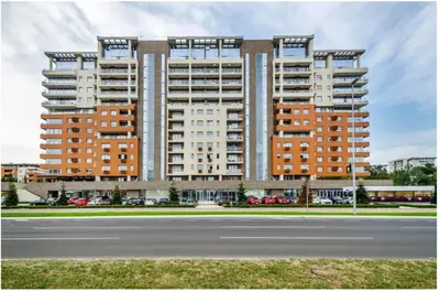 a large apartment building with a street in front of it at Apartment Premier 2 A Blok in Belgrade