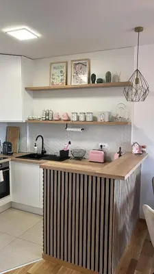 a kitchen with a counter with a sink and a counter top at Apartman Aurora in Arandjelovac