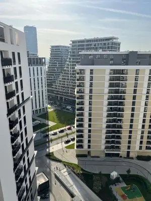 an aerial view of a city with tall buildings at Pleasure Apartment - Belgrade Waterfront in Sajmište