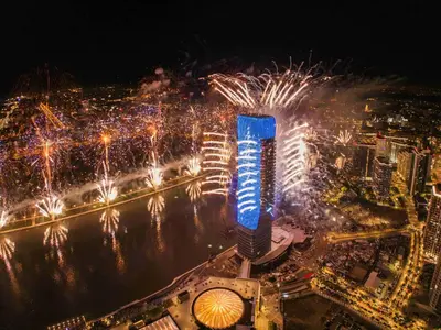 an aerial view of a city at night with fireworks at Exceptional Belgrade Waterfront Apartment - Beograd na Vodi in Belgrade