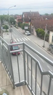 a view of a street from a balcony at Stan 3 UB in Ub
