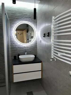 a bathroom with a sink and a mirror at Perla Lux 2 Apartments in Arandjelovac