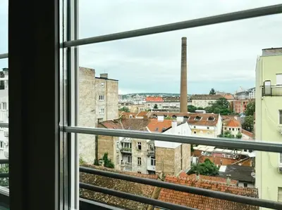 a view of a city from a window at Terrace Charm 25 in Belgrade