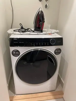 a microwave with a computer on top of it at BW Elena in Belgrade