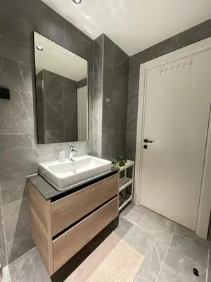 a bathroom with a sink and a mirror at BW Elena in Belgrade
