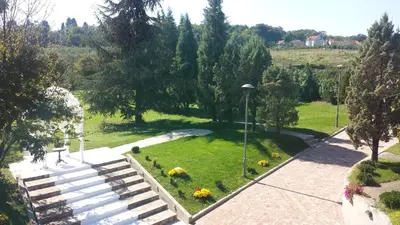 an aerial view of a park with stairs and flowers at Hotel Radmilovac in Belgrade