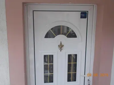a white door with a window on it at Apartment Gajic in Belgrade