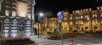 a building with a street sign in front of it at Apartman Savamala Promenada 57 in Belgrade