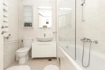 a bathroom with a toilet and a sink and a shower at Fortuna - cozy studio to relax Novi Beograd, parking 5 eur per day in Belgrade