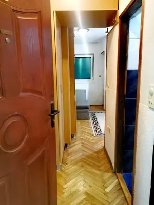 a hallway leading into a room with a door at Apartman Mirka 2 in Karaburma