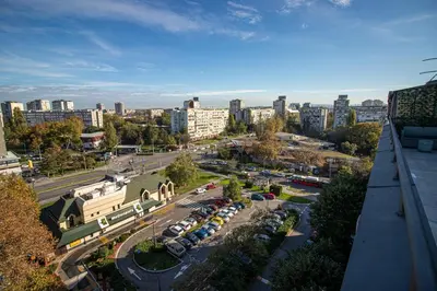 a view of a city with cars parked in a parking lot at Sunny Nest Apartment in Fontana