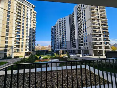 a view of two tall buildings from a balcony at Belgrade Waterfront Cozy Symphony 1 in Sajmište