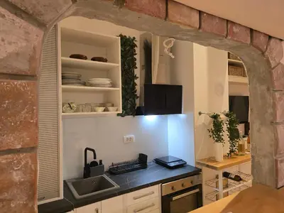 a kitchen with a sink and a counter top at Apartman Stepa K3 in Belgrade