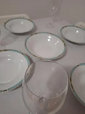a group of empty wine glasses sitting on a table at RIVIJERA GREEN in Belgrade