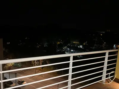 a view from a balcony at night at Silicon Valley studio in Belgrade