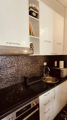 a kitchen with a sink and a counter top at Top Republic in Belgrade