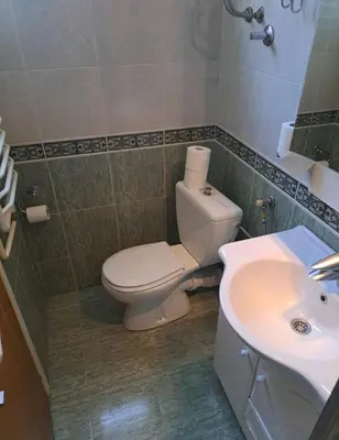 a bathroom with a toilet and a sink at Apartman 2001 Stari grad in Belgrade