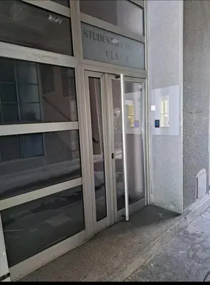 an entrance to a building with a sliding glass door at Apartman 2001 Stari grad in Belgrade