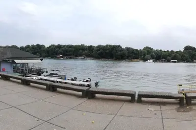 a dock with a boat in the water at Atelje 11 in Belgrade