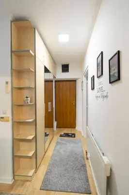a hallway with a staircase and a room with a stair case at Train 23 in Belgrade