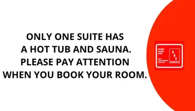 a sign that reads only one suite has a hot tub and sauna at Authentic Belgrade Centre Suites with Patios in Courtyard for Smokers in Belgrade