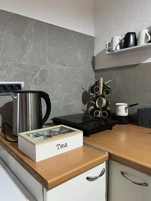 a kitchen with a tea box on a counter at Old town Belgrade apartment in Belgrade