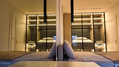 a bedroom with a bed and a mirror at New&Luxurious, Central&Comfortable in Belgrade