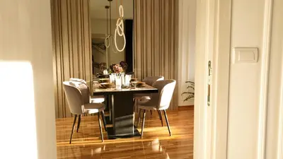 a dining room with a table and chairs at New&Luxurious, Central&Comfortable in Belgrade