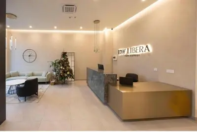 a lobby with a reception desk in a building at Galerija Libera in Belgrade