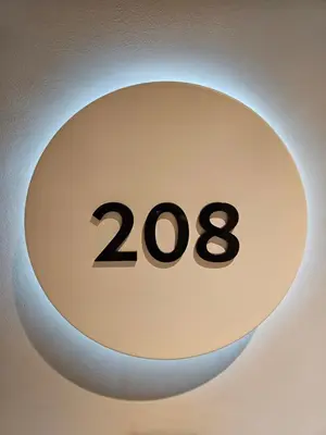 a sign with the number on a wall at Dimiant Lux River BW in Sajmište