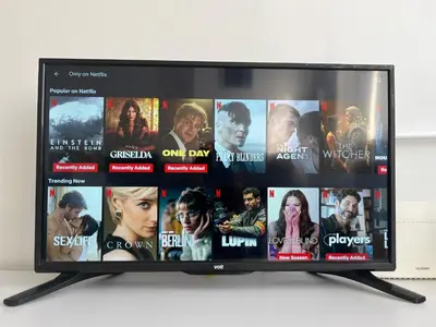 a television screen with many movies on it at Lenny apartman in Belgrade