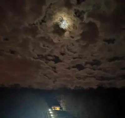 a full moon in the sky with clouds at Brvnara in Arandjelovac