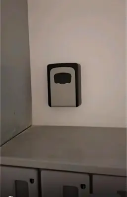 a black picture of a toaster on a wall at Lux studio sa saunom Ampelitsi in Ledine