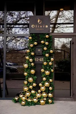 a display of cupcakes in front of a building at Olivia Rooms in Belgrade