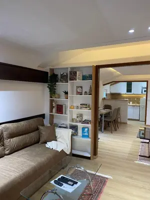 a living room with a couch and a table at Kapetan-Misa in Belgrade