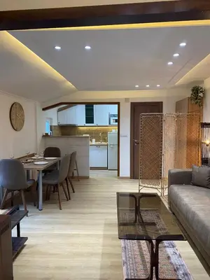 a living room with a couch and a table at Kapetan-Misa in Belgrade