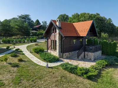a small house with a red roof at Ozoni & Spa in Sopot