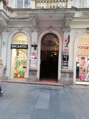 an entrance to a store in a building at Knez Mihailova apartment - City Center in Belgrade